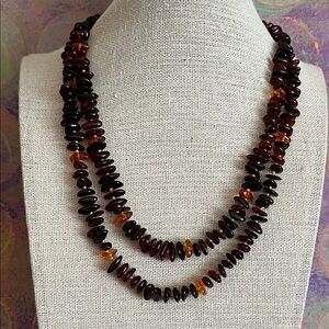 Pretty divided strand small polished Baltic amber nuggets knotted gold thread